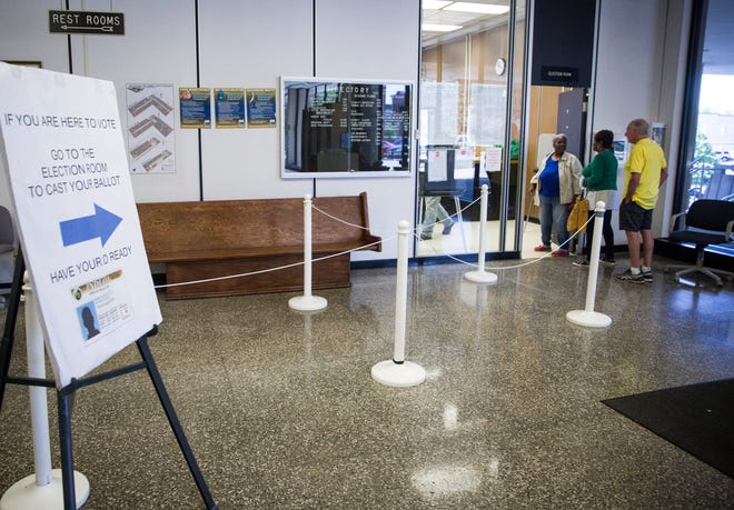 A few last minute voters sign in and cast their ballot during the final day of early voting on May 6 at the Delaware County government building. According to officials over 1,400 ballots were cast during the early voting period.