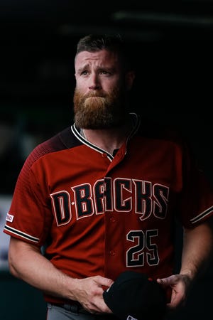 May 5, 2019: Arizona Diamondbacks relief pitcher Archie Bradley (25) in the dugout after being pulled in the eighth inning against the Colorado Rockies at Coors Field.
