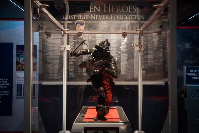 A statue of Stephen Siller in the Foundation Room of the traveling 9/11 Never Forget Mobile Exhibit. The exhibit is from the Stephen Siller Tunnel to Towers Foundation and is named for a firefighter who died while responding to the terrorist attacks.