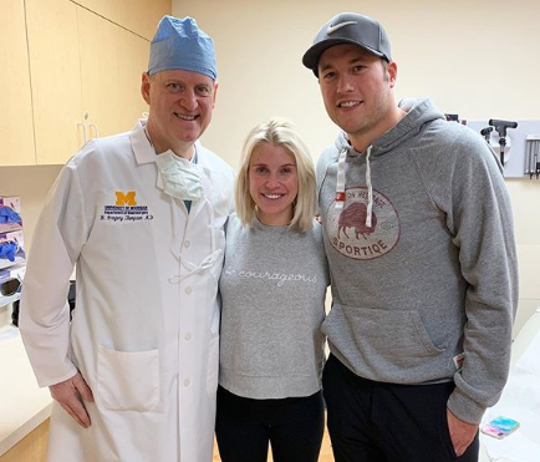 Kelly Stafford and Matthew Stafford with Dr. B. Gregory Thompson.