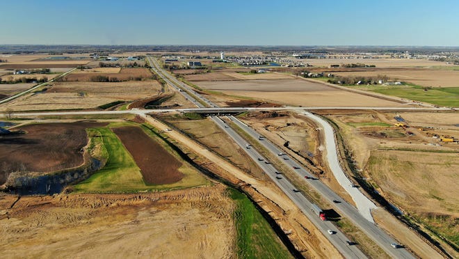 This drone photo taken looking north in late April shows paving progress on the new West Forevergreen Road interchange with I-380 at the North Liberty/Coralville boundary line. The project is expected to be completed this fall.