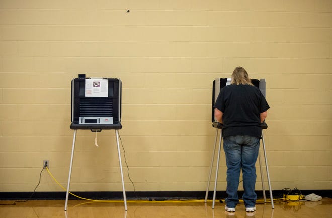 A Muncie resident casts their ballot on May 7 at Precinct 9 at the Southside Middle School. Voter turnouts both before the election and Tuesday afternoon were low according to officials.