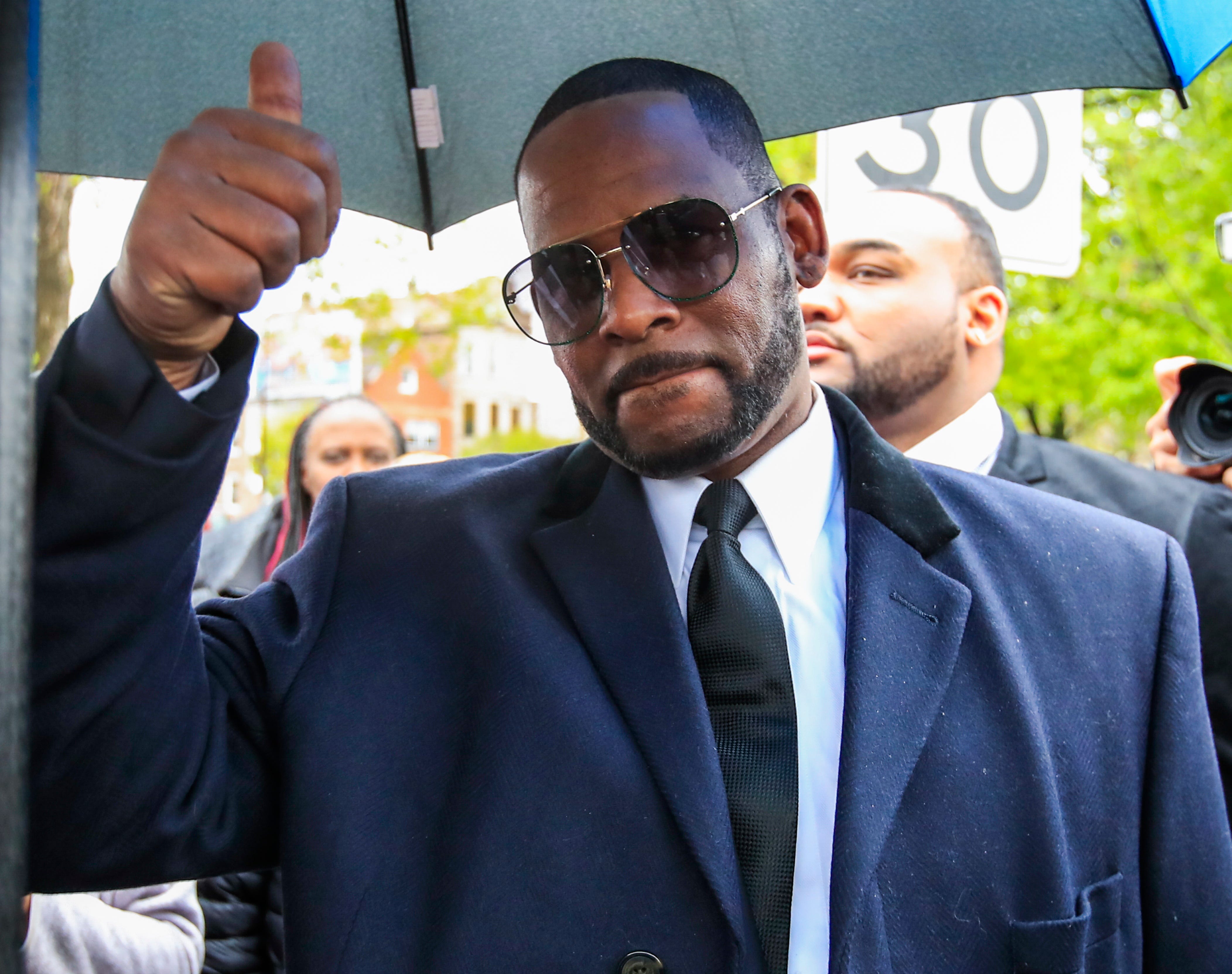 R. Kelly leaves court in Chicago after a status hearing on his sexual assault charges, May 7, 2019.