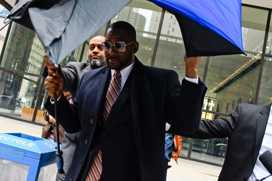 Musician R. Kelly leaves the Daley Center after a hearing in his child support case Wednesday, May 8, 2019, in Chicago.