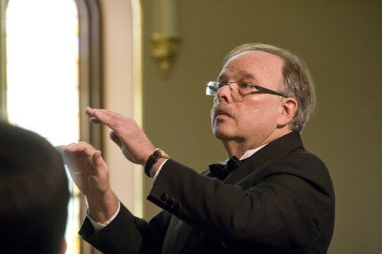 Bruce Borton is the conductor of the Madrigal Choir of Binghamton.