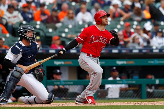 The Los Angeles Angels' Tommy La Stella blasts the first of his two home runs Thursday, and one of five hit by the Angels against the Tigers.