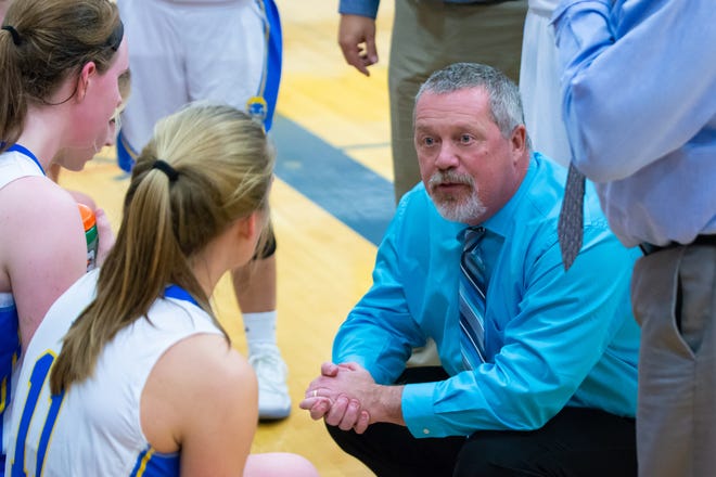 Russ Young coached the Oconto High School girls varsity basketball team for 28 years.