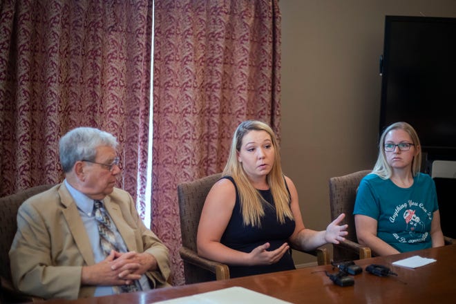 Myranda Juarez, center, speaks during a press conference at the Louisville Bar Association in downtown Louisville on Thursday, May 9, 2019.