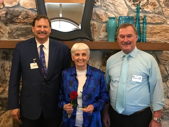 The 2019 Felician Award for Excellence in Volunteer Service at Felician Village was presented to Shirley Horn (center) at a ceremony on April 12. The award was presented by Frank Soltys, president/CEO (left), and Tim Lindloff, volunteer coordinator (right).