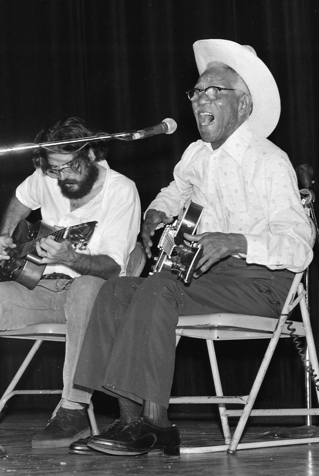 Memphis blues musician Furry Lewis belts out a song during a performance at the Orpheum Theatre accompanied by Lee Baker on Sept. 17, 1978.