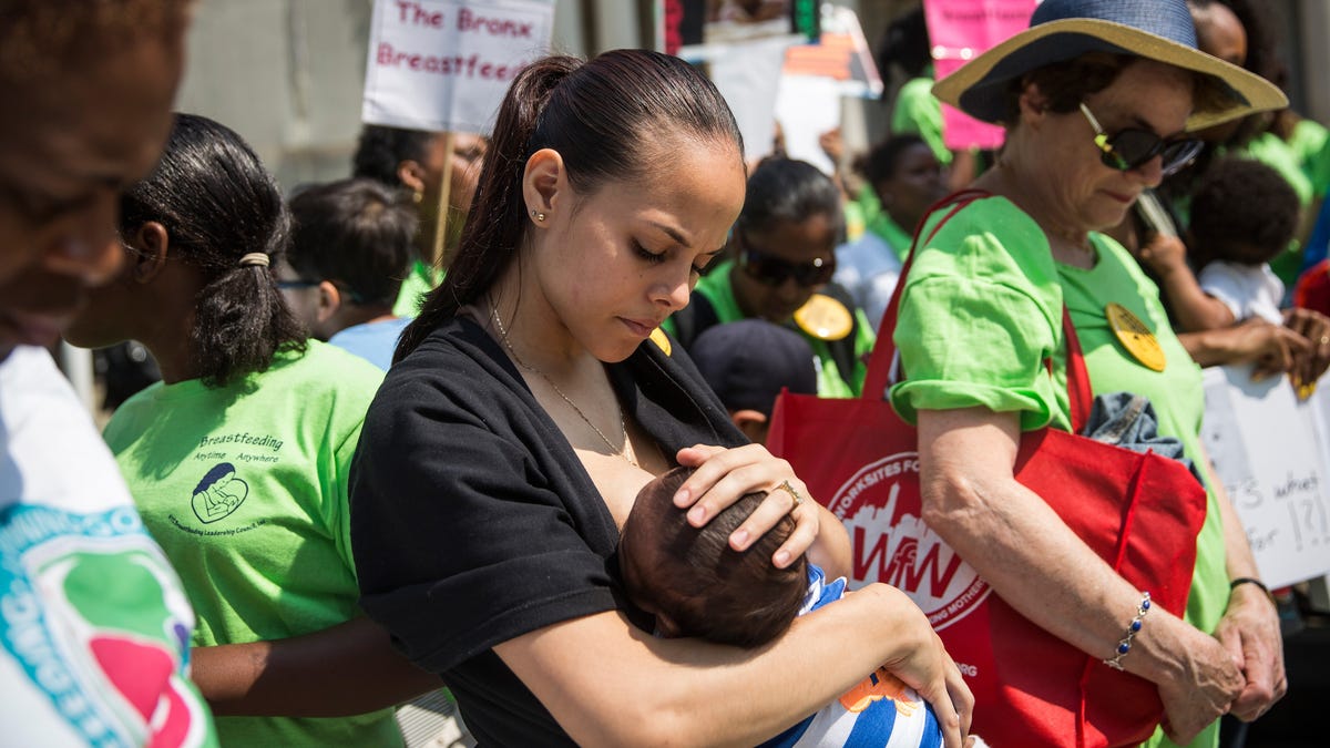 Crystal Mauras breastfeeds her 2-month-old son, Christopher Rhodes Jr., outside New York City Hall during a rally to support breastfeeding in public on August 8, 2014.
