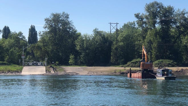 A mound of rock yet to be removed can be seen between the ferry ramp and boat ramp at the Wheatland Ferry Wednesday, May 8, 2019.