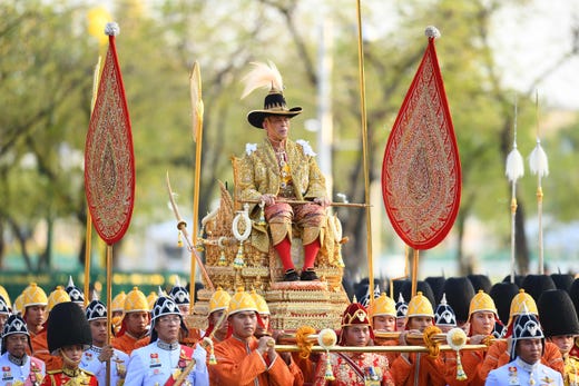 Thailand's King Maha Vajiralongkorn is carried in a golden palanquin during the coronation procession in Bangkok on May 5, 2019.