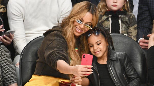 Beyonce and Blue Ivy Carter attend the NBA...