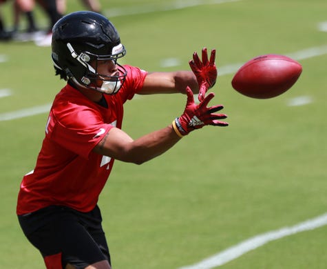 Atlanta Falcons wide receiver TaQuon Marshall catches a pass during NFL football rookie camp, Friday, May 10, 2019, in Flowery Branch, Ga.