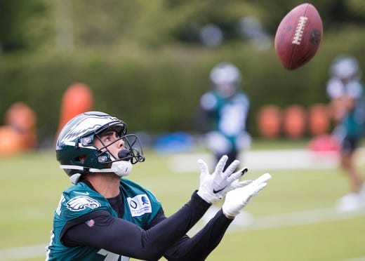 Philadelphia Eagles wide receiver J.J. Arcega-Whiteside (19) catches a ball during rookie minicamp at NovaCare Complex.