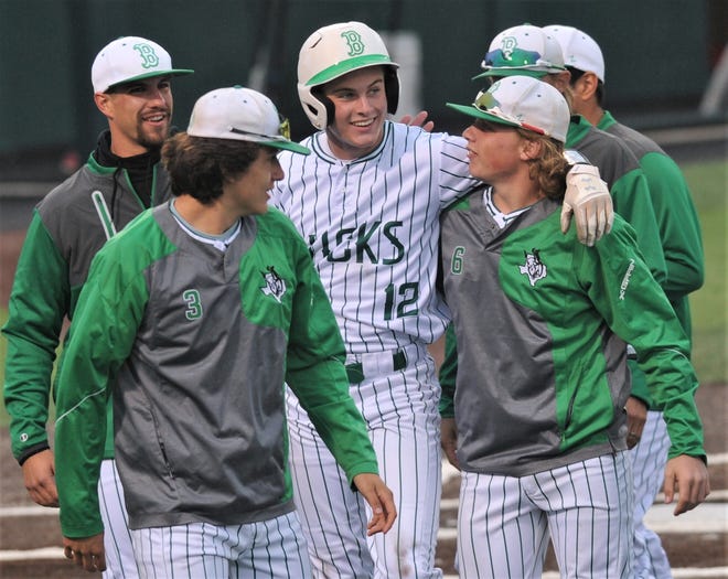 Breckenridge's Owen Woodward (12) celebrates with his teammates after ending Game 1 with a three-run home run in the sixth inning against Anson. The Buckaroos won the game 12-2 in six innings Friday, May 10, 2019, at ACU's Crutcher Scott Field. They swept the Region I-3A second-round series with a 13-1 victory in five innings in Game 2 later that night.