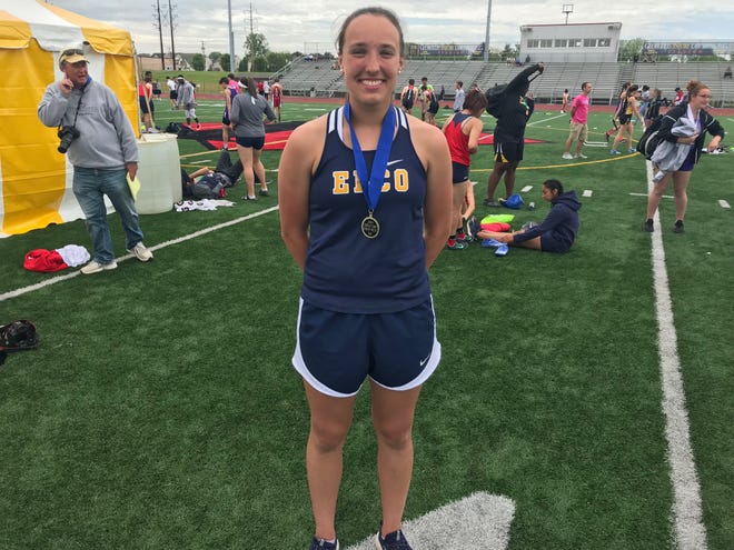 Elco's Ryelle Shuey with her gold medal in the girls shot put at Saturday's Lancaster-Lebanon League Championships.
