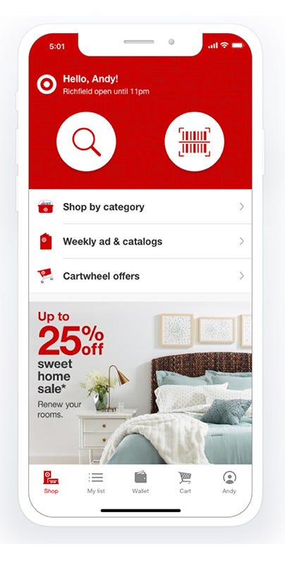 From the home screen on the Target app for Apple devices, click the magnify glass to find items and offers or select the barcode to bring up the scanner.