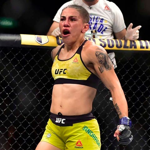 Jessica Andrade reacts after beating Rose...