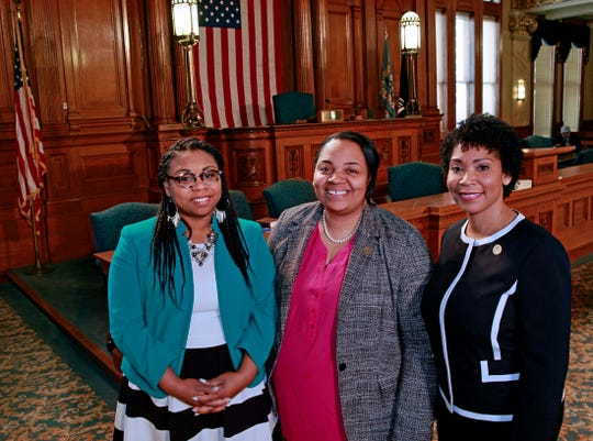 Milwaukee Alderwomen (from left)  Chantia Lewis, Milele Coggs and Nikiya Dodd in May inside the Common Council chambers at Milwaukee City Hall.