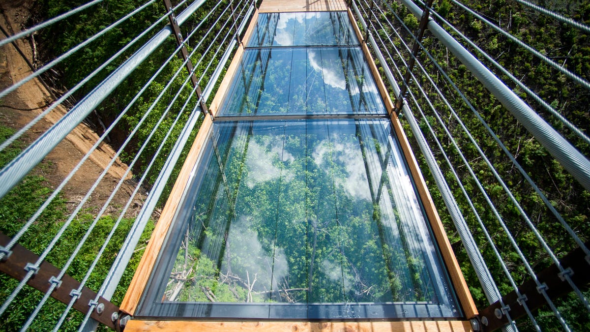 Glass-floor panels in the middle of the Gatlinburg SkyBridge on Tuesday, May 14, 2019. The SkyBridge is North America's longest pedestrian suspension bridge and offers panoramic views of Gatlinburg and the Smoky Mountains.