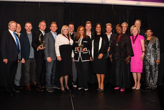 Pictured L to R: Gene Krcelic, Don Finto, Shane Quick, Gary Gentry, Roy Morgan, Dottie Leonard Miller, Jay DeMarcus, Yvette Boyd, Joe Don Rooney, LaDonna Boyd, Gary LeVox, Tramaine Hawkins, Don Moen, Janet Paschal, John Huie and GMA President & Executive Director Jackie Patillo  at the GMA Honors and Hall of Fame Ceremony in Nashville, Tenn. on May 8, 2019.