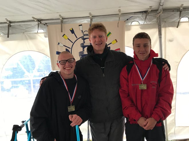 Joe Dietterick (left to right), coach Paul Myers and Jason Wheeler earned gold in the adaptive double event.
