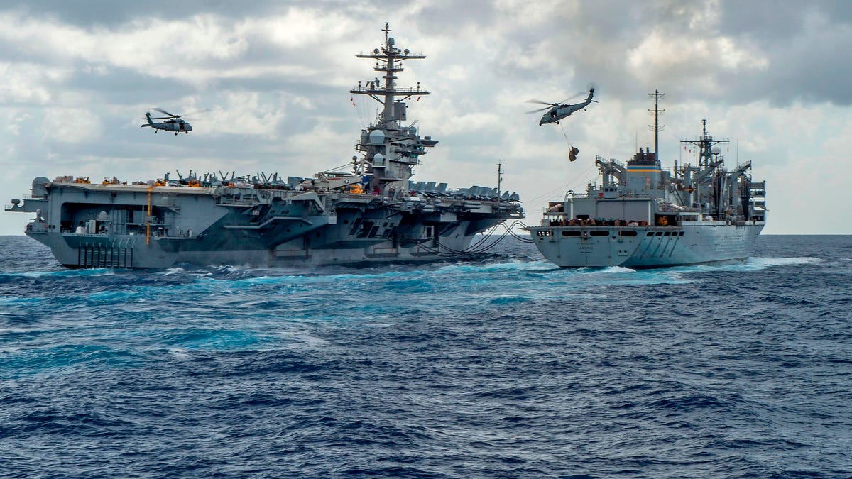 This handout picture released by the U.S. Navy on May 8, 2019, shows the Nimitz-class aircraft carrier USS Abraham Lincoln conducting exercises in the Persian Gulf.