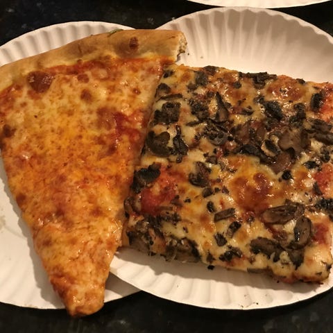 Dinner for one: a plain cheese slice of the...