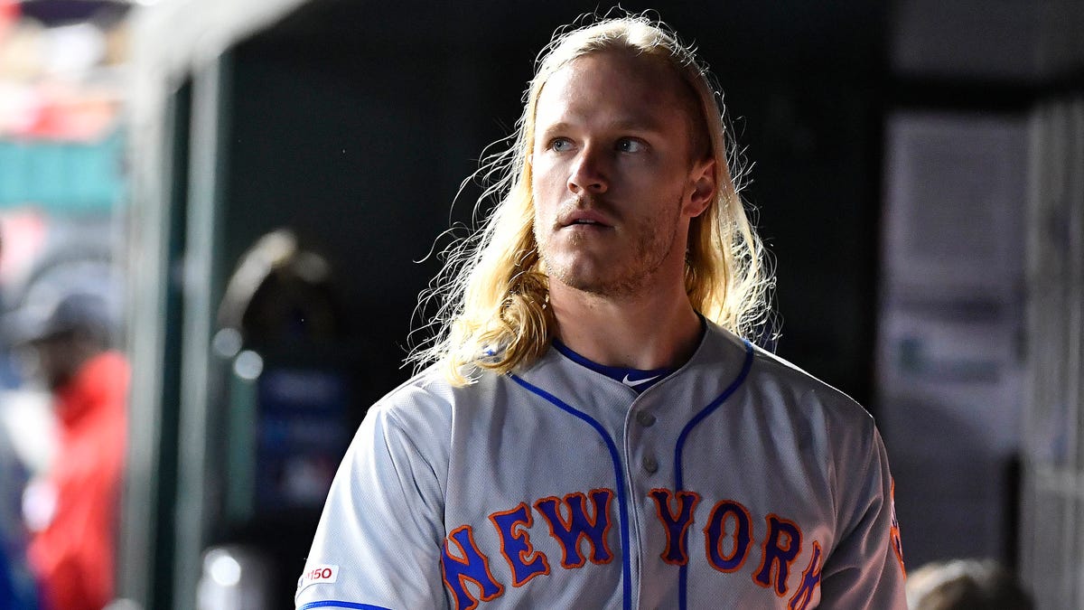May 14, 2019; Washington, DC, USA; New York Mets starting pitcher Noah Syndergaard (34) looks on from the dugout during the sixth inning against the Washington Nationals at Nationals Park.