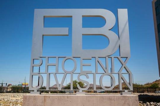 The FBI warns of 'Virtual Kidnapping Scams' luring people over the border at their Phoenix office on May 17, 2019.