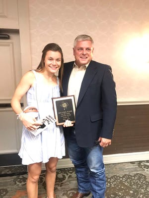 Wall High School's Sawyer Lloyd, with her stepfather Kevin Barron, was presented with her TABC Girls Class 3A Player of the Year award Thursday, May 16, in San Antonio.