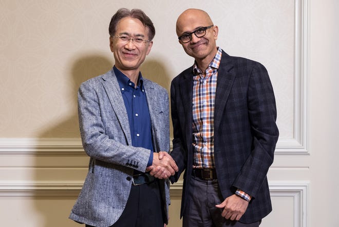 Kenichiro Yoshida, President and CEO, Sony Corporation (left), and Satya Nadella, CEO, Microsoft. The two tech companies are teaming up on the development of cloud gaming systems.