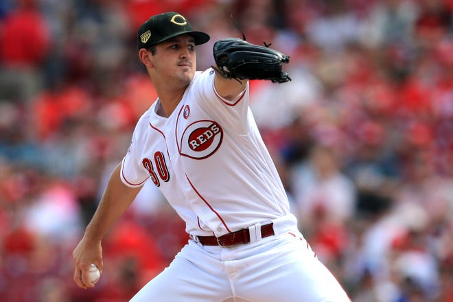 Cincinnati Reds' Tyler Mahle throws in the first inning of a baseball game against the Los Angeles Dodgers, Saturday, May 18, 2019, in Cincinnati.