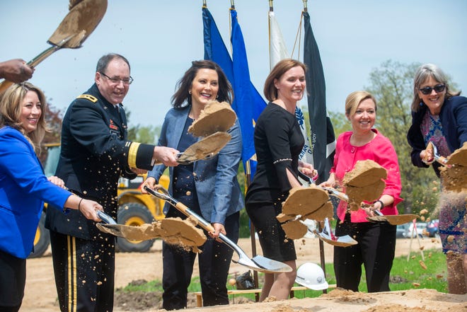 Governor Gretchen Whitmer, Senator Winnie Brinks and Grand Rapids Mayor Rosalynn Bliss help kick up the dirt on the groundbreaking ceremony of the upcoming Grand Rapids Home for Veterans on Friday, May 17, 2019 in Grand Rapids.