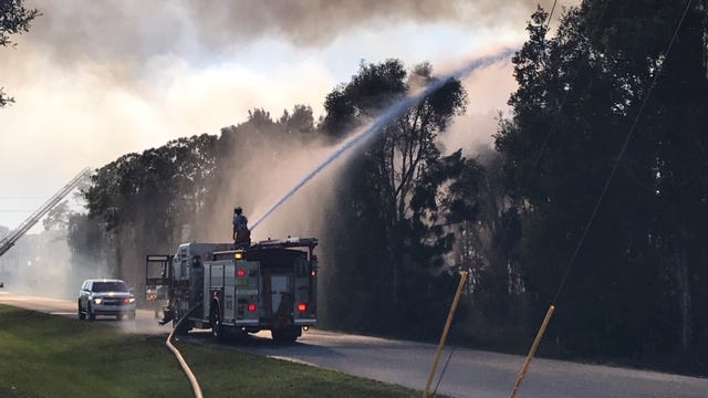 Fire crews battled a five-acre fire in Estero Saturday.