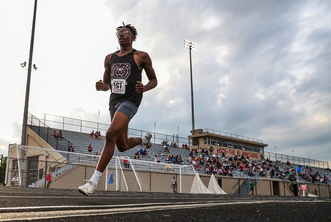 Lawrence Central senior Blaque Rutland competes in the 800 meter dash at IHSAA boys track and field sectionals at North Central High School in Indianapolis on Friday, May 17, 2019. 