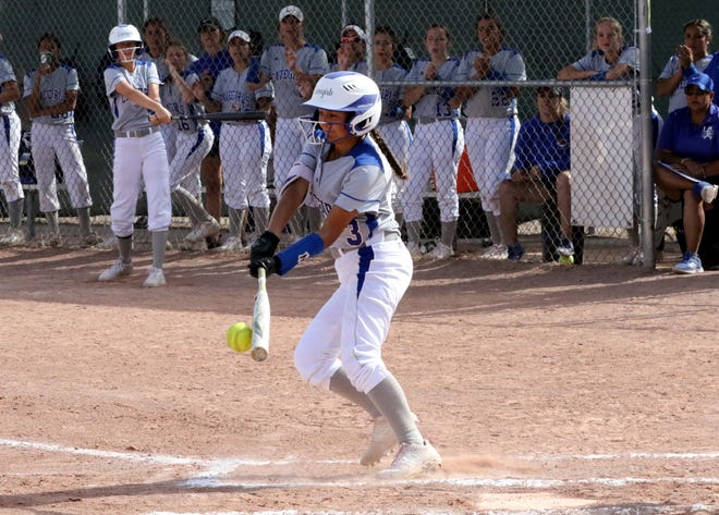 Marissa Reyes connects with a pitch against Hobbs on Friday. Carlsbad won in four innings, 17-2.