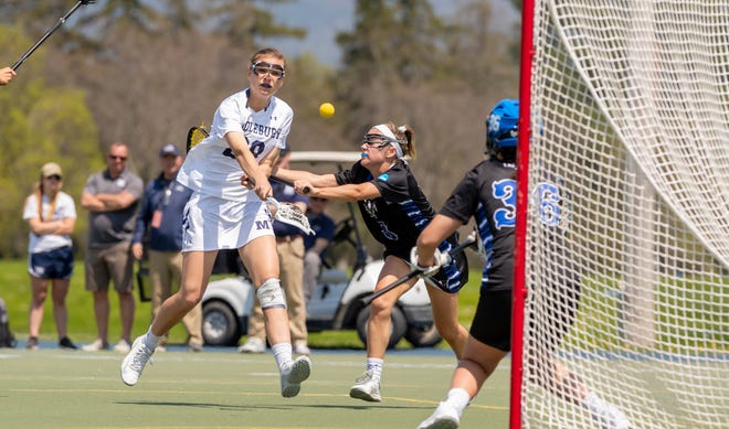 Burlington's Casey O'Neill fires a shot during Middlebury’s 16-4 win over Franklin & Marshall in the NCAA Division III quarterfinals on Sunday.
