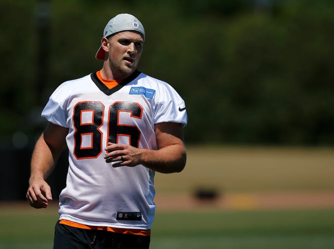 Cincinnati Bengals tight end Mason Schreck (86) works on the rehab field during practice in the first day of OTAs at the Paul Brown Stadium practice field in downtown Cincinnati on Monday, May 20, 2019.