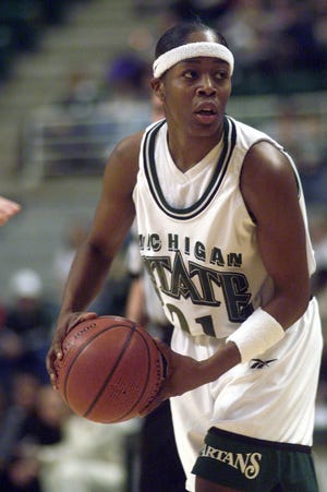 Maxann Reese, a member of the 1999 women's basketball team at Michigan State, was charged with seven counts of false pretenses between $20,000 and $50,000 in connection with a fraud investigation into the Healing Assistance Fund. She plays basketball here in this 1999 file photo against University of Wisconsin.
