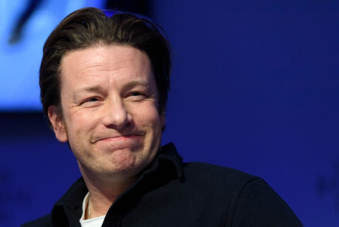 In this Wednesday, Jan. 18, 2017 file photo, British chef Jamie Oliver attends a panel session during the 47th annual meeting of the World Economic Forum, WEF, in Davos, Switzerland.