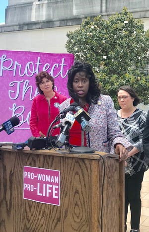 Rep. Katrina Jackson, D-Monroe, and Sen. Beth Mizell, R-Franklinton (back left), were among those speaking Wednesday, May 21, during a press conference supporting Jackson's anti-abortion rights bill.