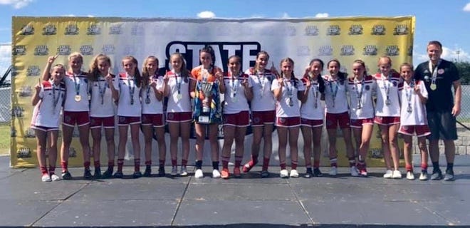 The Florida Fire Juniors U14 girls won the FYSA State Cup in Auburndale this past weekend. The Fire are coached by Chris Cashion, far right. Members of the team are: Edin Abougzir, Alexandra Blose, Adeline Brown, Madison Connaway, Morgan King, Cameron Levantini, Annika Lindquist, Elaina Loden, Ansley Mancini, Hana Markovic, Caprice Morely, Caitlyn Rogers, Briana Shimer, Molly Vickaryous and Madilyn Winn.