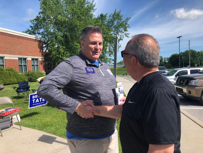 Bryan Tate, a Republican candidate for York County Register of Wills, meets with voters outside the Manchester Township polling place Tuesday, May 21. Tina Locurto photo