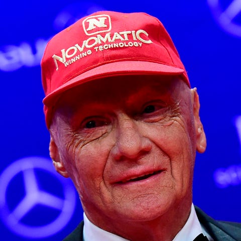 Niki Lauda poses with his Lifetime Achievement...
