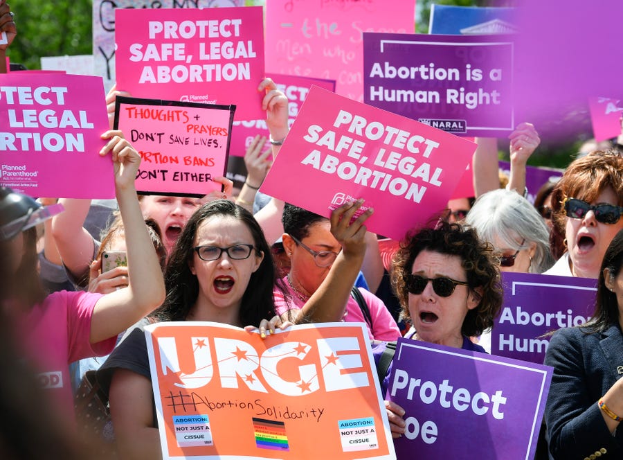 Protesters rally May 21 on the steps of the Supreme Court to stop abortion restrictions.