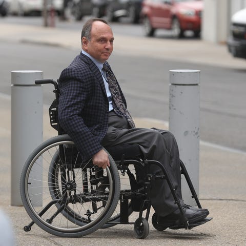 Developer Robert Morgan leaves federal court in Bu