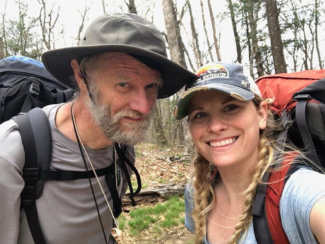 Joseph White and Heather Grow on the Appalachian Trail in Georgia. White owns Staunton's Cranberry's Grocery and Eatery while Grow is the store's manager. White has been hiking the trail since April and Grow joined him for the first two days of the adventure.